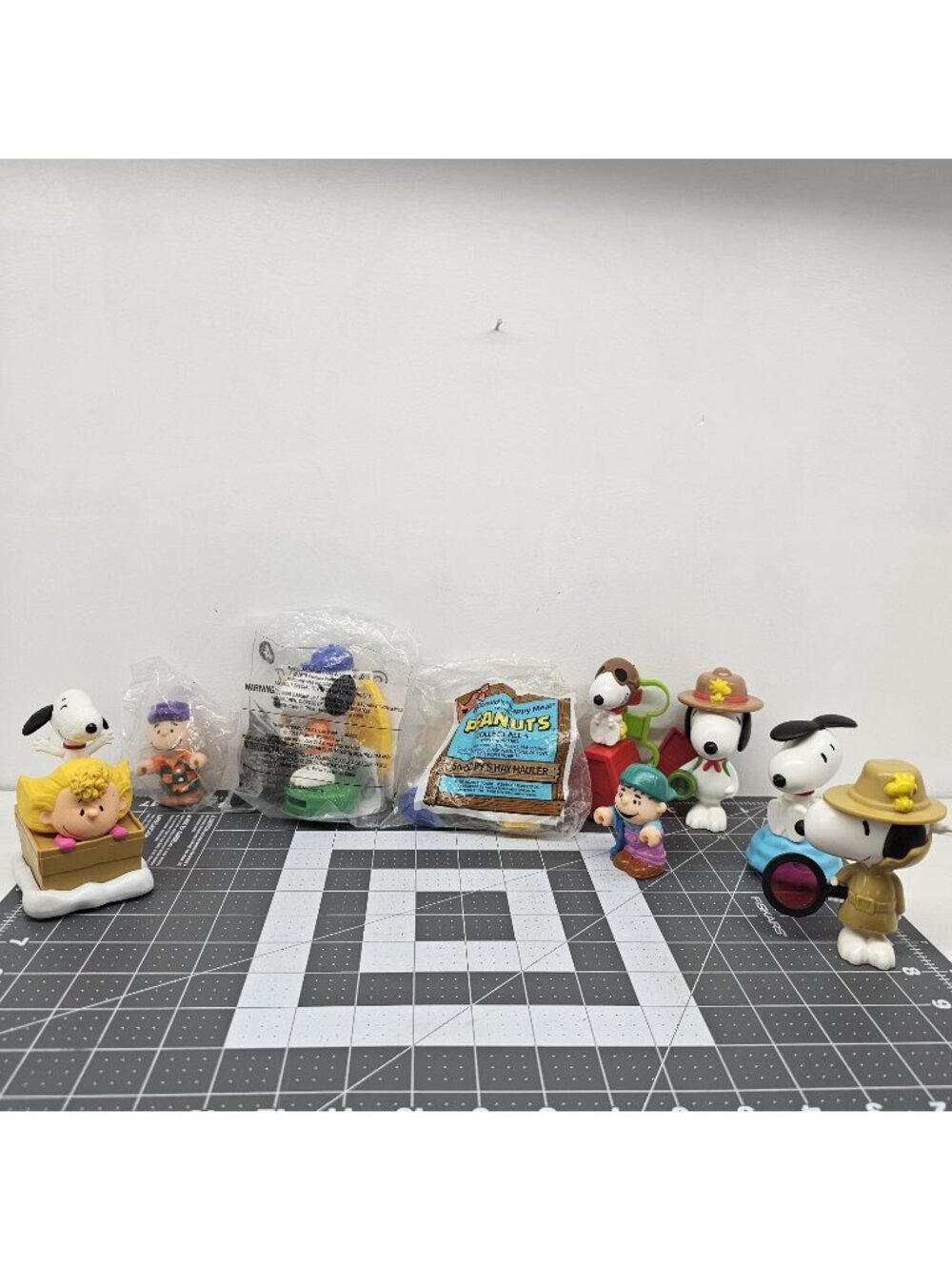 Lot of 9 Charlie Brown Peanuts Snoopy Toys Figures Mixed Sizes Hay Hauler
